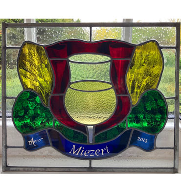 Glas-in-lood met gebrandshilderd glas